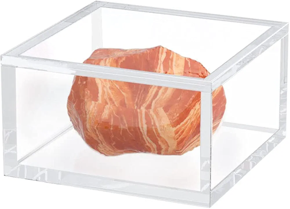 Product photograph of some kind of rock or crystal that to be honest looks a lot like meat encased in a thick glass box. Not sure where this is from.